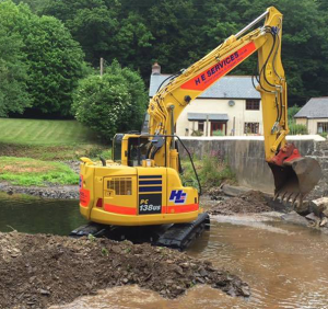 Plant Hire Equipment - Hire a PC138 - Shown in stream at work digging