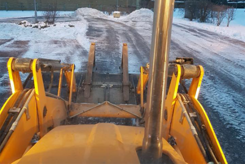 H. E. Services JCB clearing snow